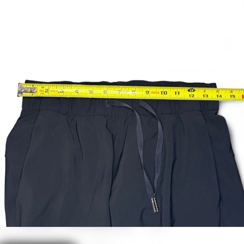 Lululemon On The Fly Pant Black Size 4 Woven High Rise Work Travel